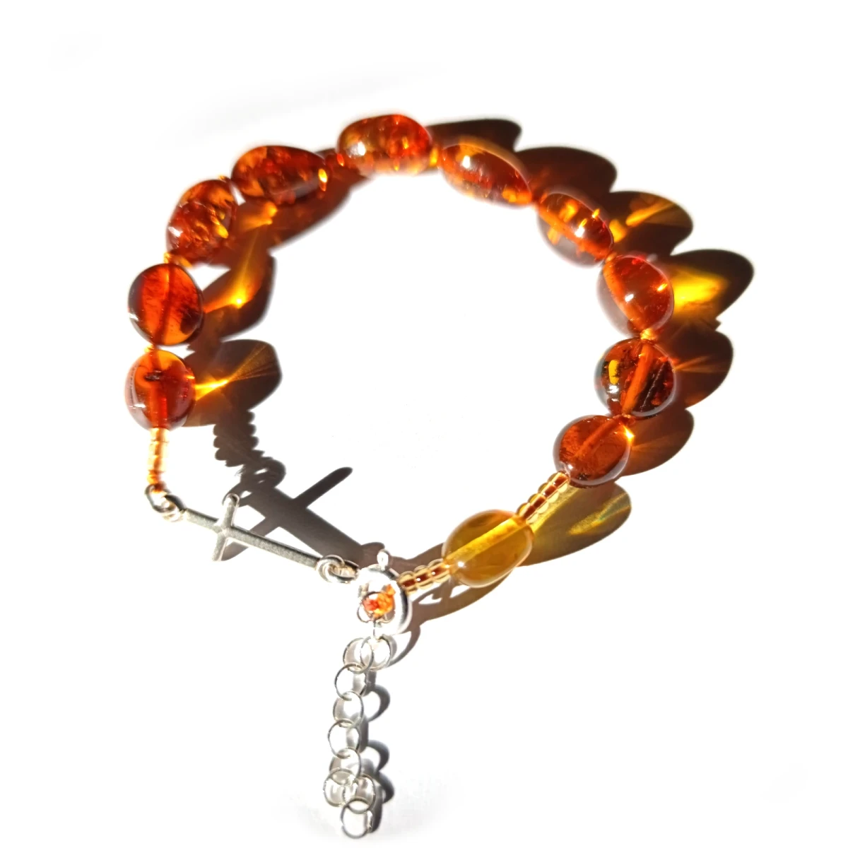 Różaniec bursztynowy. Dziesiątka na sznurku. Krzyżyk srebrny