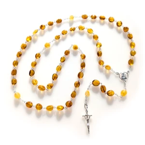 Różaniec bursztyn łączony srebrem. Krzyż Papieski, łącznik z MB Częstochowską. 