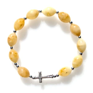 Różaniec bransoletka, dziesiątka. Jasny bursztyn na gumce ze srebrem.   