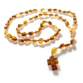 Rozaniec-Bursztyn-na-sznurku-54931-210-01B.webp
