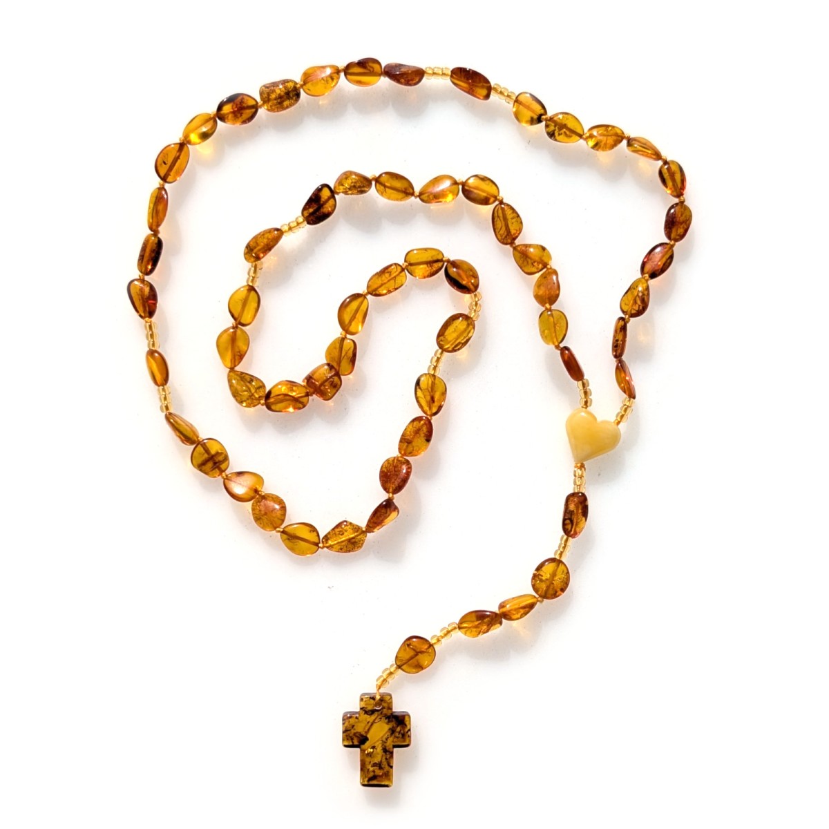 Różaniec bursztyn na sznurku. Krzyż bursztynowy.