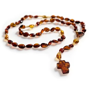 Różaniec bursztyn na sznurku. Krzyż bursztynowy.