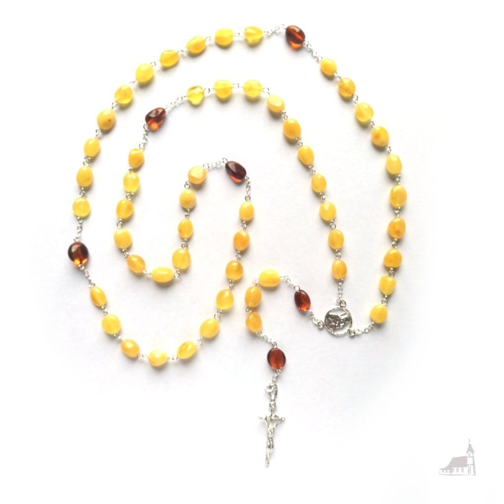 Różaniec bursztynowy jasny + srebro. duże paciorki. Krzyż Papieski.